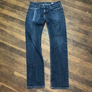 ABSOLUTELY FABULOUS Gold sign blue jeans.